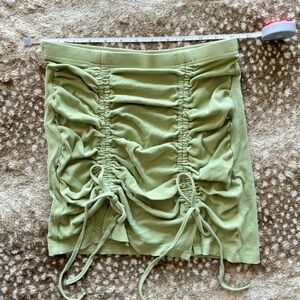 Stretchy green mini skirt